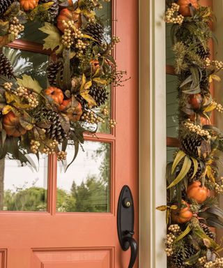 Outdoor Thanksgiving decor ideas. Fall garland wreath around pink front door