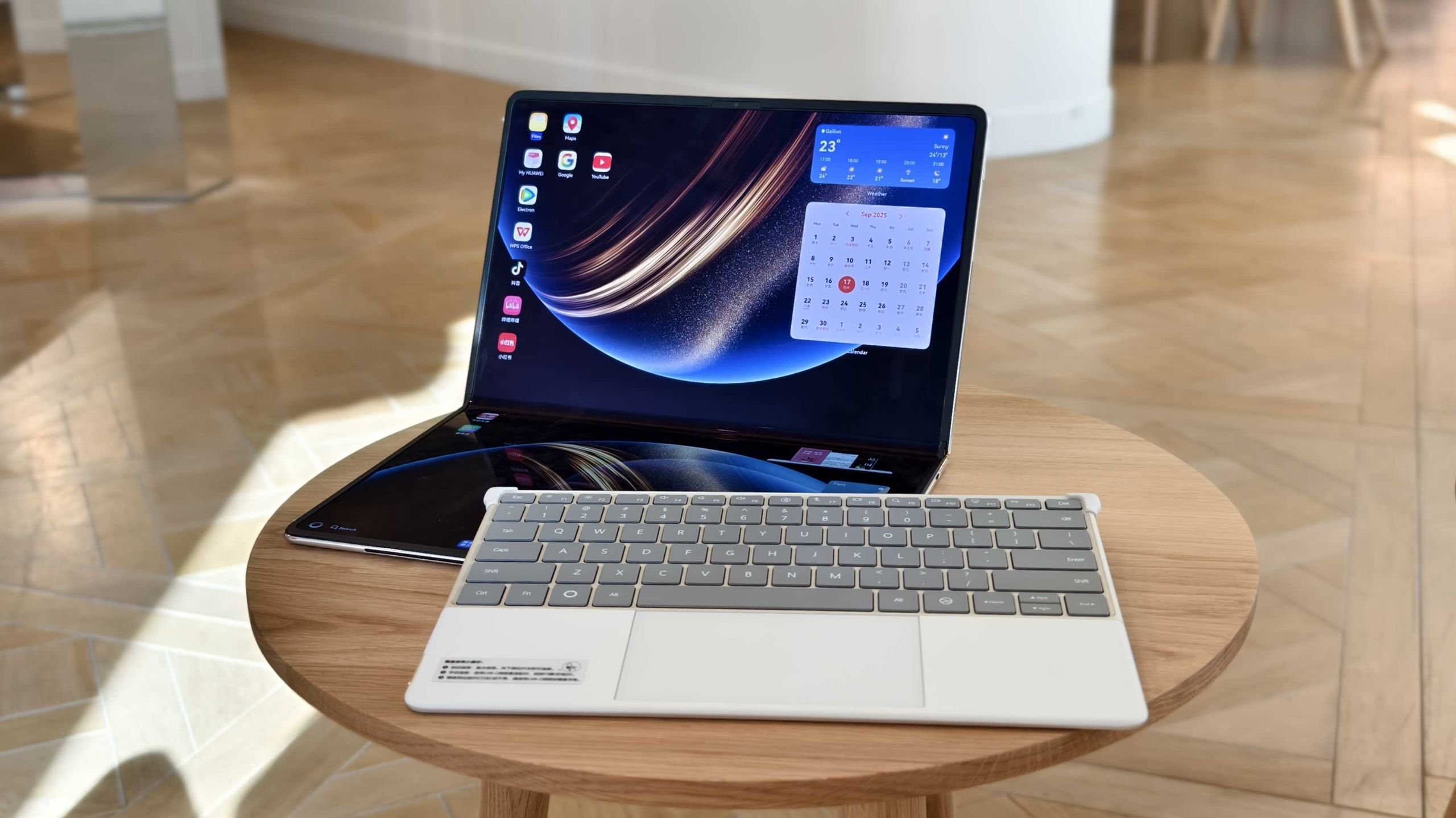Huawei MateBook Fold screen and keyboard kept separately.