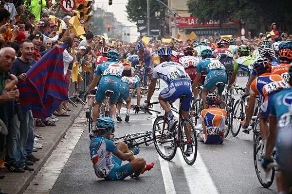 Laurens ten Dam and Yukiya Arashiro go down in a pile-up.
