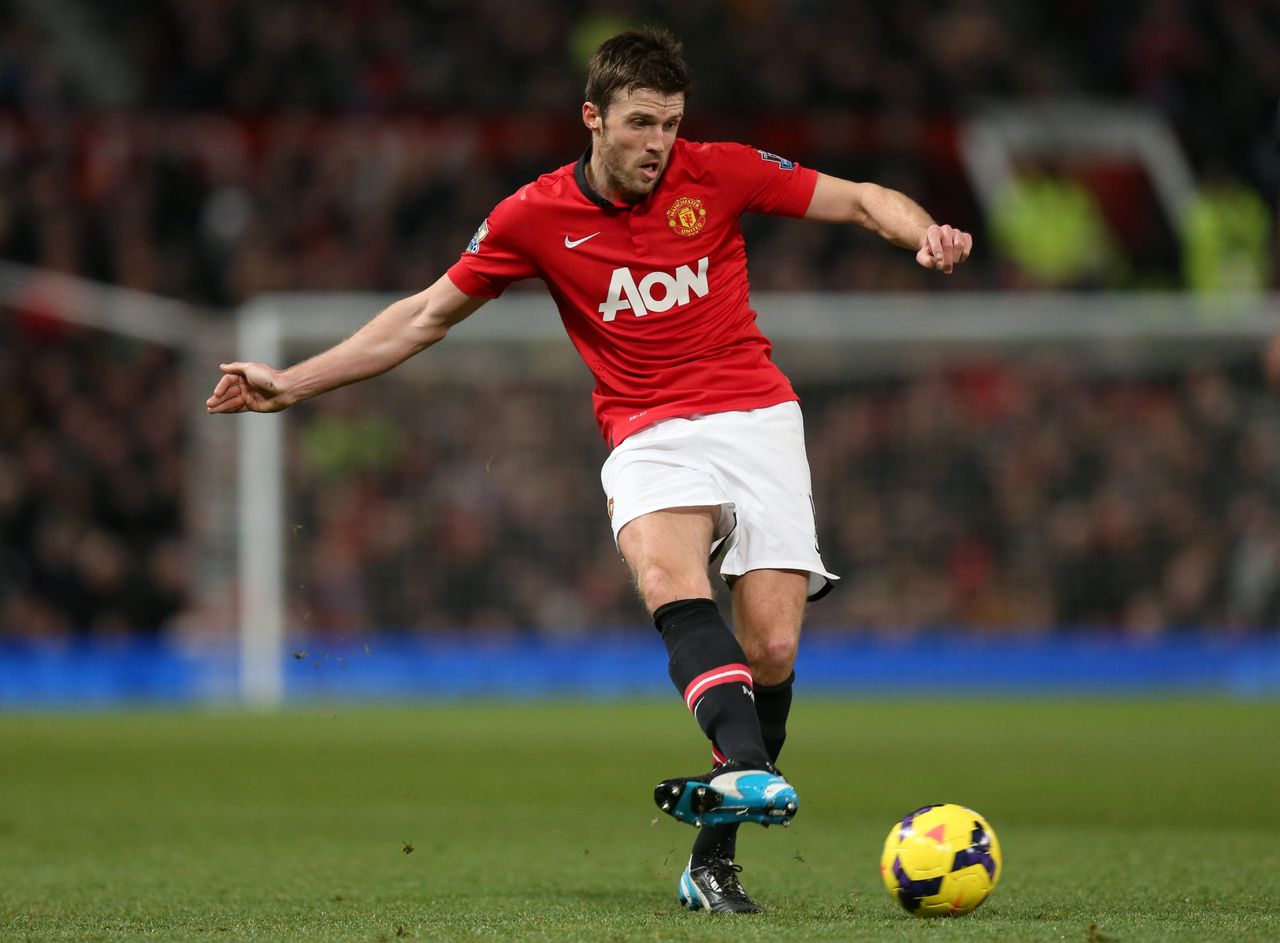 Michael Carrick in action for Manchester United against Swansea City in 2014