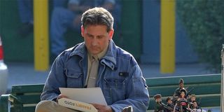 Welcome to Marwen Mark Hogancamp (Steve Carell) looking at photos on bench