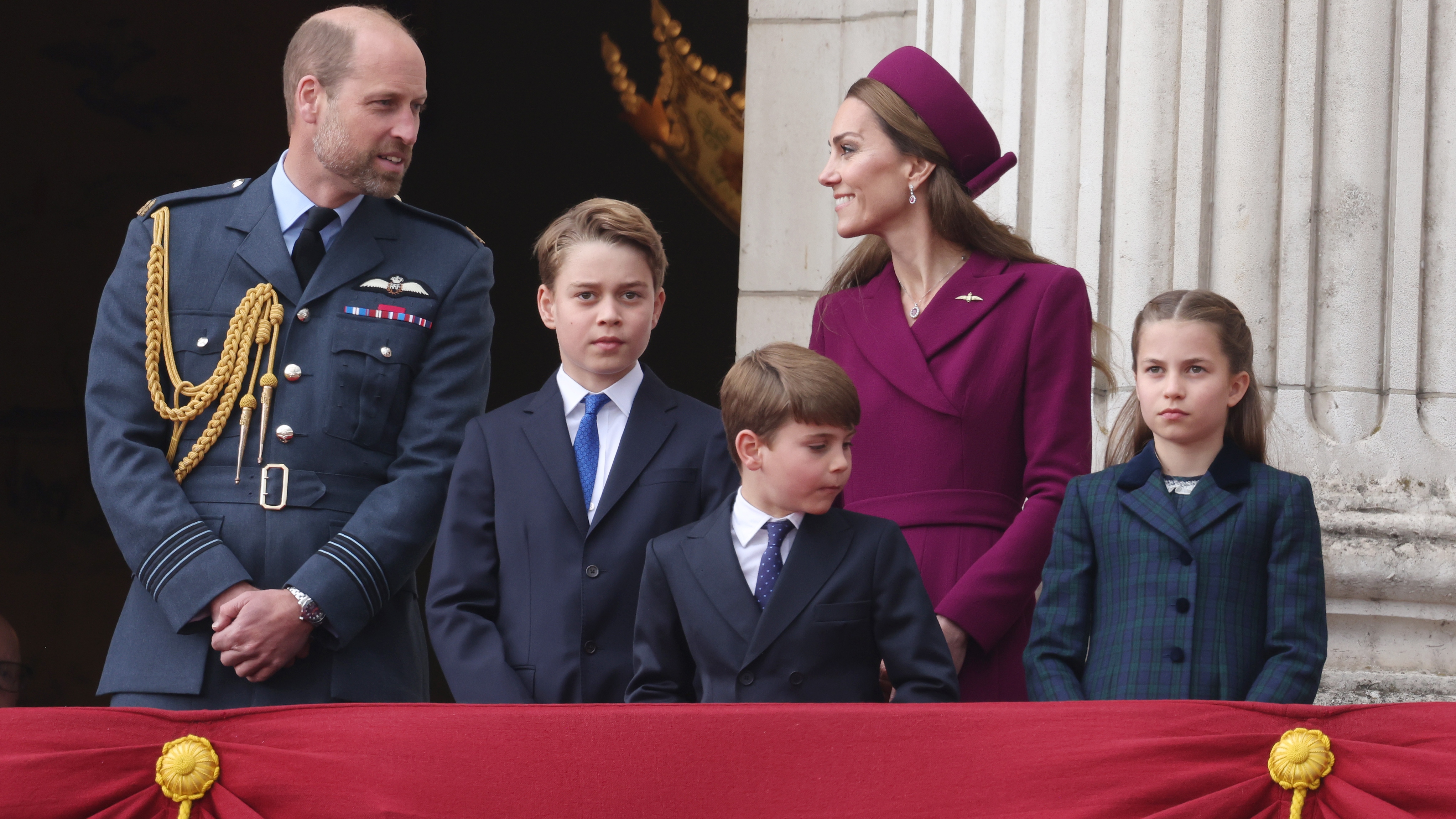 Prince William, Prince George, Prince Louis, Catherine, Princess of Wales and Princess Charlotte on the balcony of Buckingham Palace during the military procession to mark the 80th anniversary of VE Day on May 05, 2025