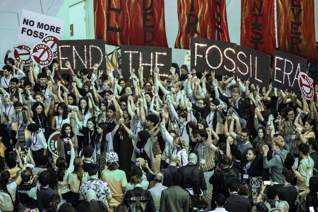 Young activists stage a protest in COP28 conference venue, Blue ZOne as COP28, UN Climate Change Conference comes to an end