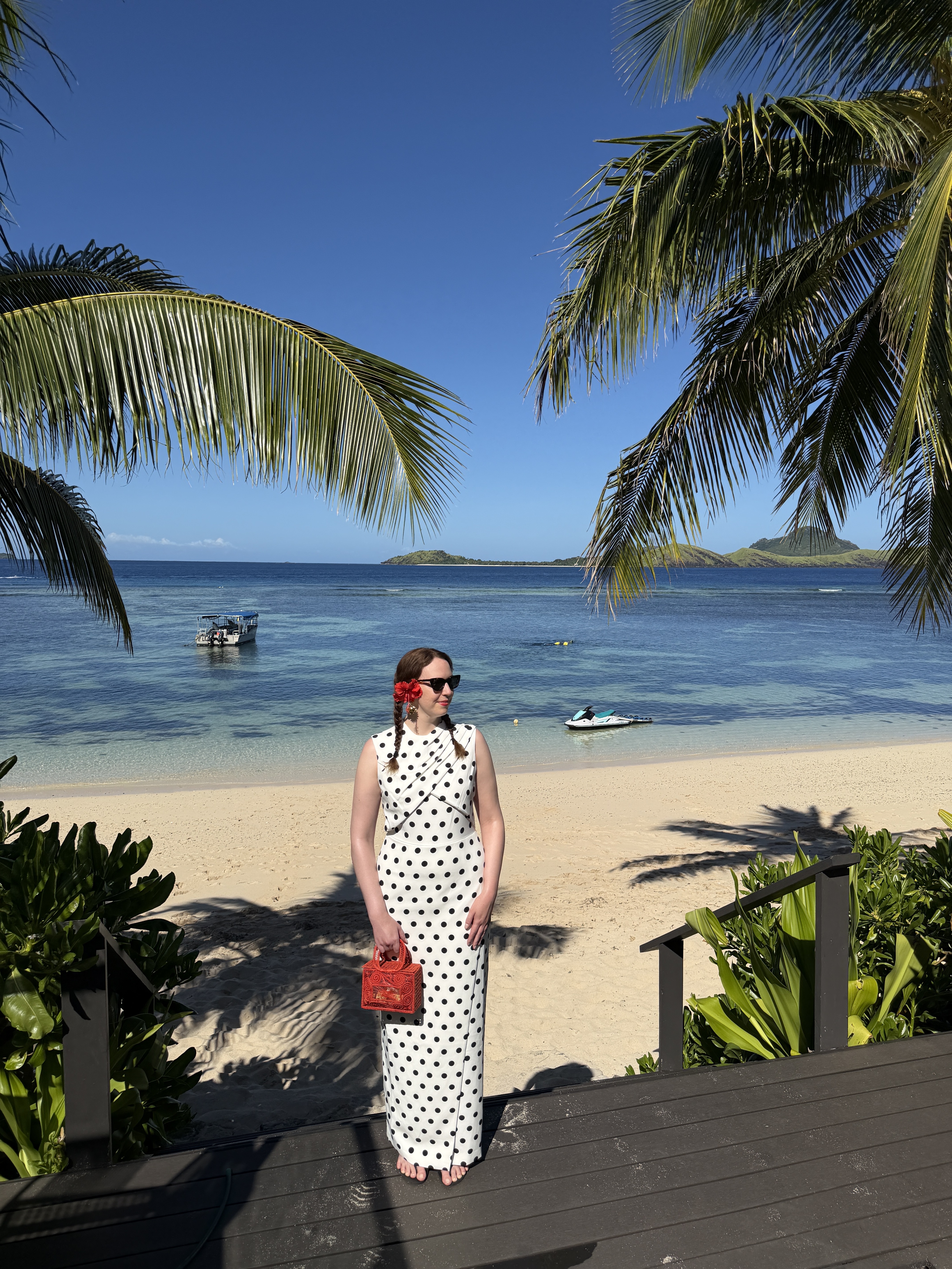 Fashion editor Erin Fitzpatrick wears a polka dot dress in Fiji