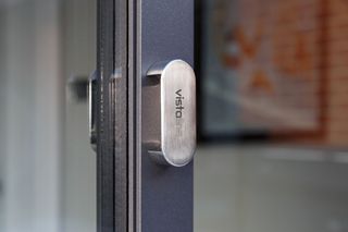 A close up of the handle on an IDSystems glazed door