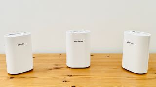 Devolo WiFi 7 Mesh BE6500 system on wooden table