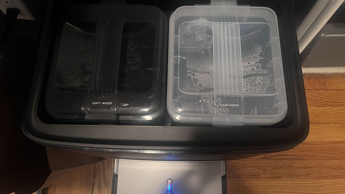 cleaning station housing two water tanks, one dirty, one clean, for the DEEBOT X2 OMNI robot vacuum cleaner and mop