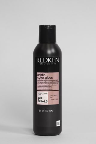 Redken Acidic Color Gloss Activated Glass Gloss Treatment shot in Marie Claire's studio, one of the best hair glosses