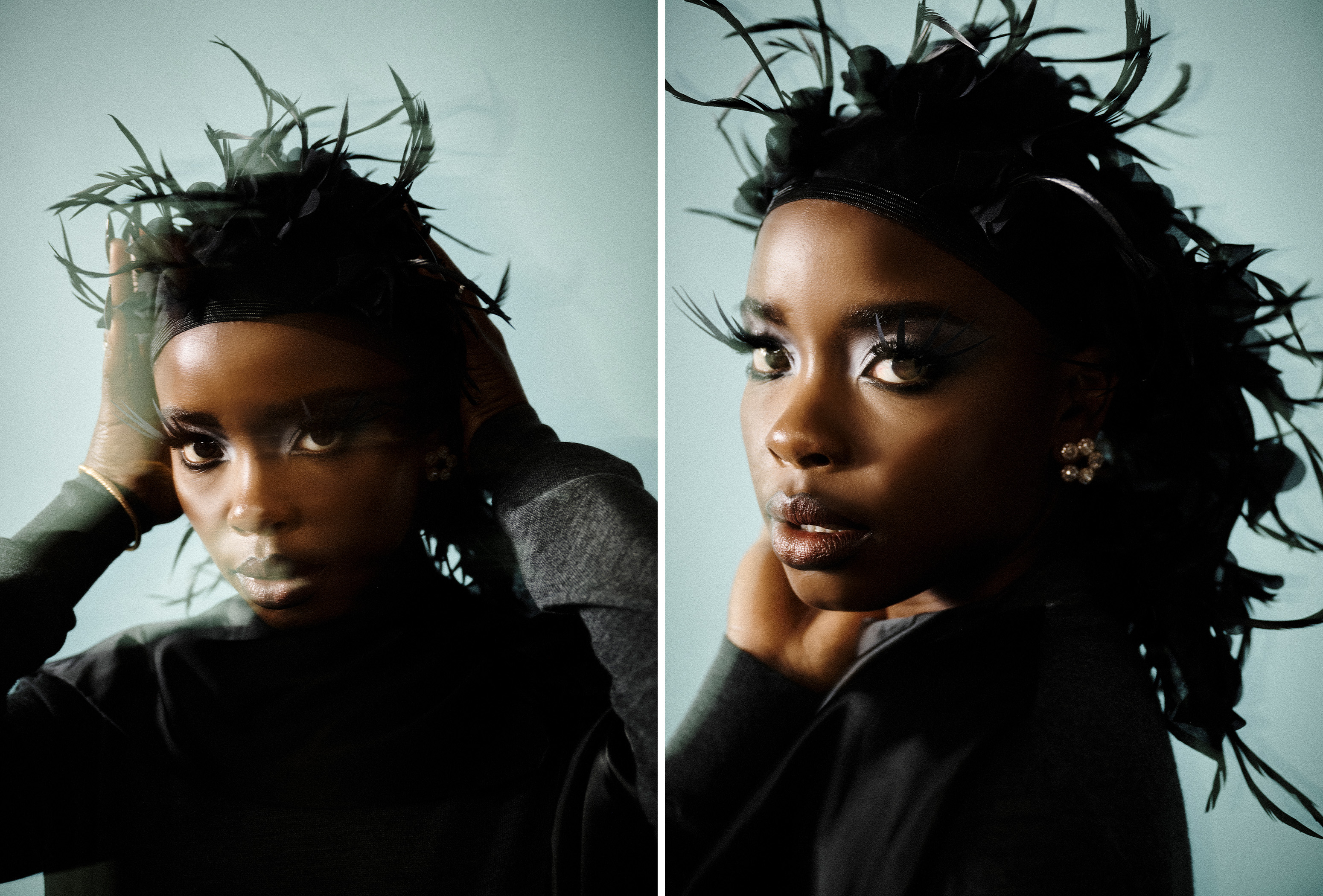 Images of Joy Sunday wearing an organza ruffled feather hood with a black viscose top with cape detailing. She is wearing extra long lashes.