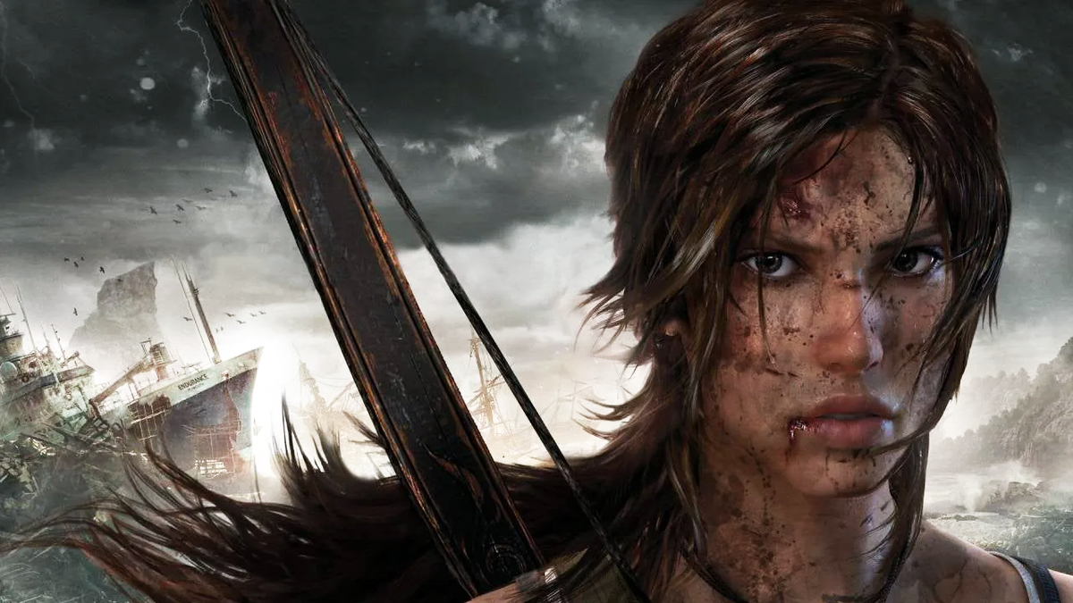 Lara Croft, Tomb Raider&#039;s hero, staring out at the viewer with a wrecked ship on a coast depicted in the background