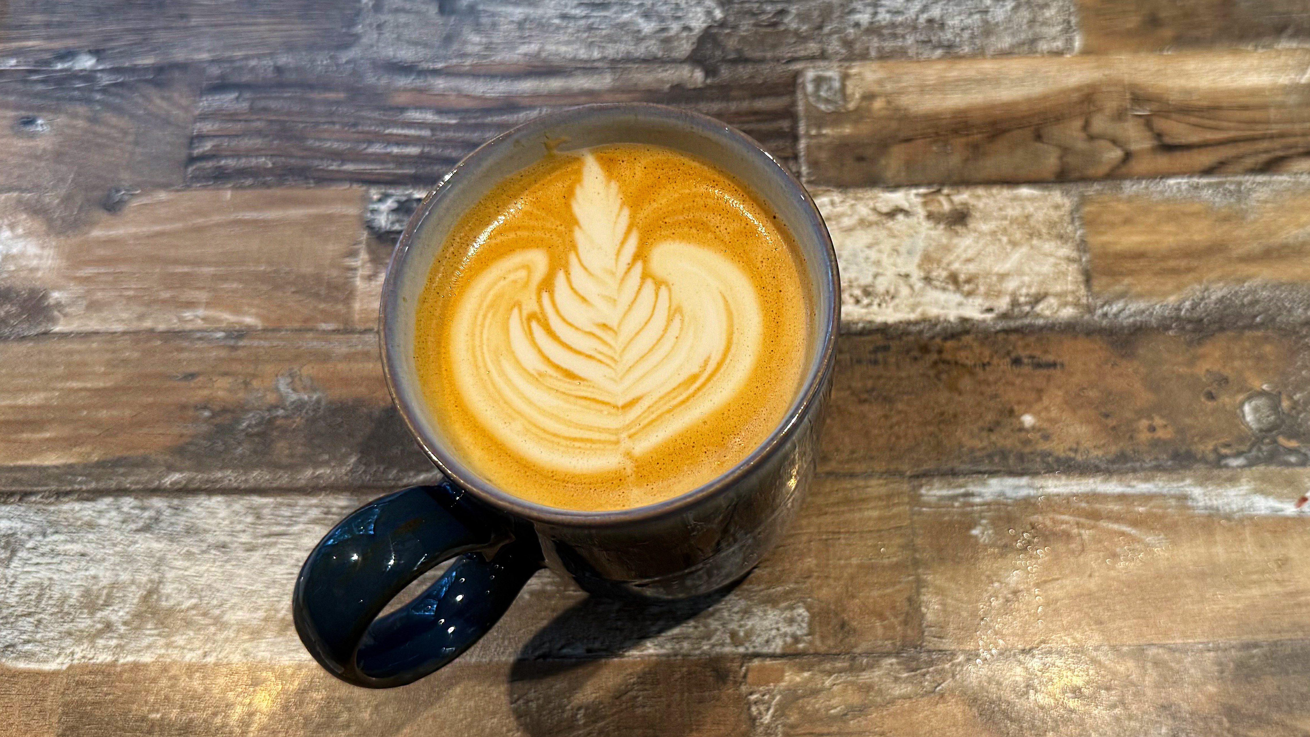 an oat milk latte made on the breville oracle dual boiler sage oracle dual boiler espresso machine