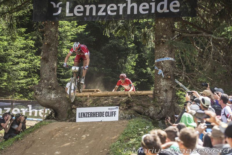 Nino Schurter (Scott-Odlo MTB Racing Team) and Jaroslav Kulhavy (Specialized Racing) race over the cliff