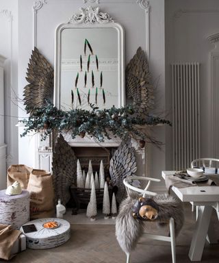 living room with metal angel wings