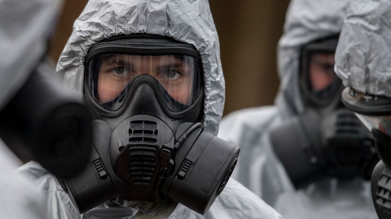 Military personnel wearing protective suits to investigate the nerve agent attack in Salisbury on 4 March