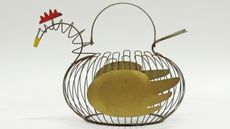 Our alternative Easter eggs include this vintage Italian wire chicken egg basket