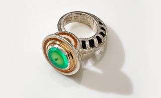 Silver and copper ring with green stone