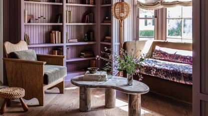 Wooden, purple shelves, wooden armchair