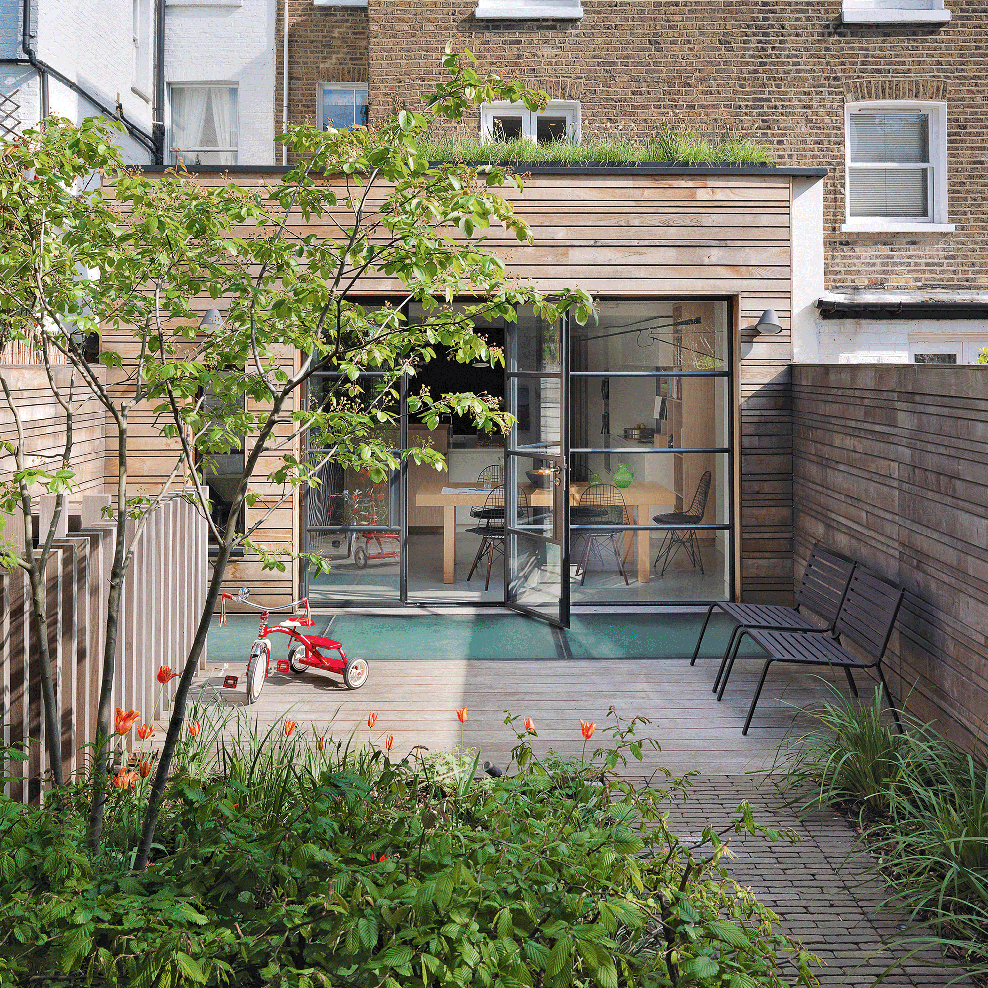 Decking with large open glass doors