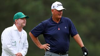 Sandy Lyle in conversation with his caddie during The Masters