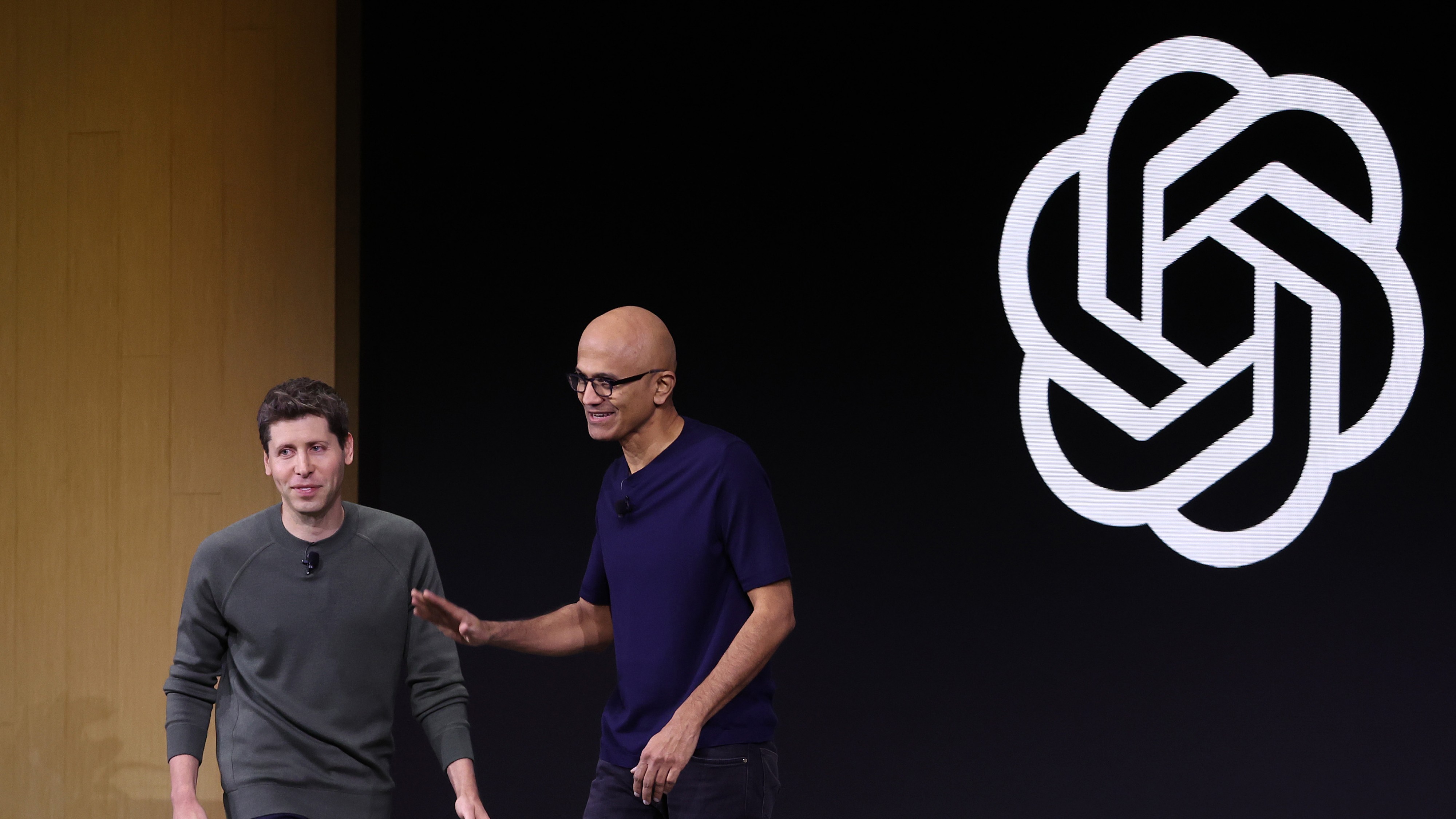 Microsoft CEO Satya Nadella (R) greets OpenAI CEO Sam Altman during the OpenAI DevDay event on November 06, 2023 in San Francisco, California.