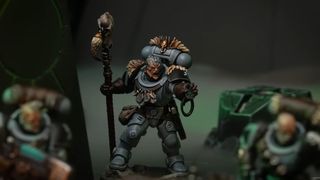 Space Wolves Kill Team: Dead Silence models on a Necron battlefield