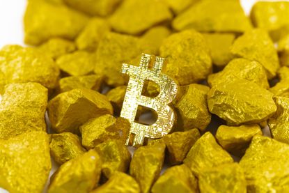 Bitcoin and gold nuggets.