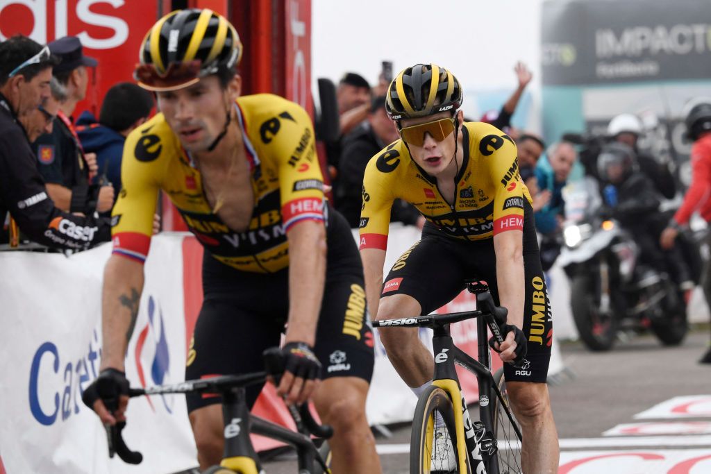 Team Jumbos Slovenian rider Primoz Roglic L crosses the finish line in first place followed by Team JumboVismas Danish rider Jonas Vingegaard during the stage 17 of the 2023 La Vuelta cycling tour of Spain a 1244 km race between Ribadesella and Alto de lAngliru on September 13 2023 Photo by MIGUEL RIOPA AFP Photo by MIGUEL RIOPAAFP via Getty Images