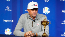 Keegan Bradley speaks to media next to the Ryder Cup