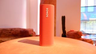 Hero image for best Bluetooth speakers showing Sonos Roam in orange