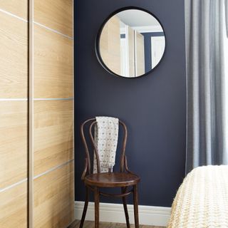 bedroom wardrobe and wooden chair