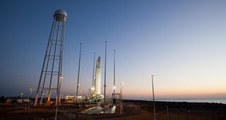 Antares on launch pad at sunrise