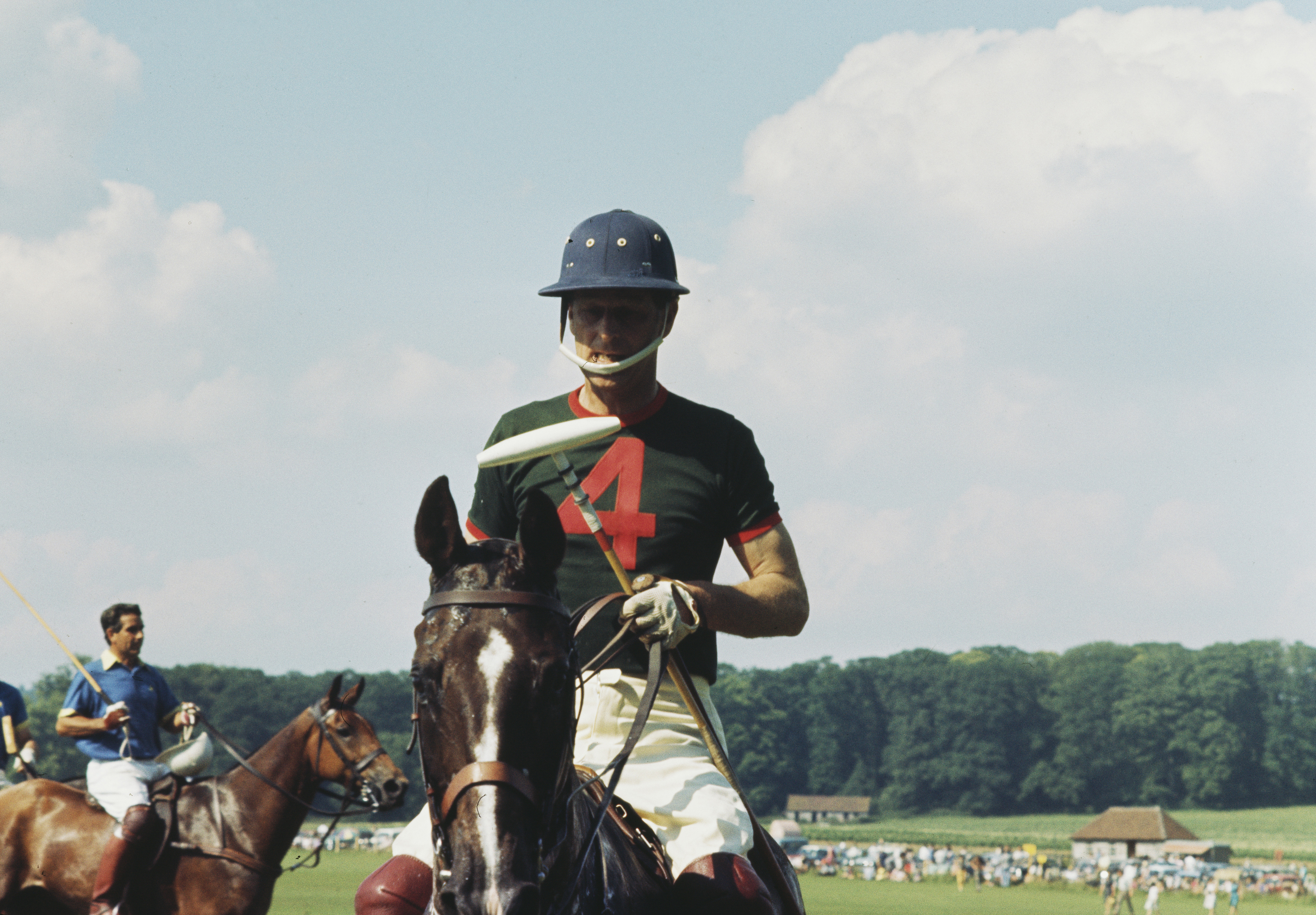 Prince Philip on horseback playing polo, competing at Cowdray Park Polo Club in July 1966