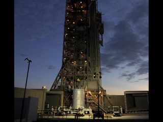In the predawn light of August 18, 2011, NASA's twin Gravity Recovery and Interior Laboratory (GRAIL) spacecraft arrive at at Space Launch Complex 17B at Cape Canaveral Air Force Station in Florida.
