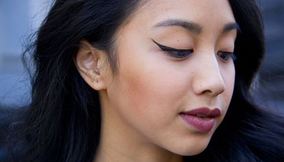  Mai Nguyen with cat eye black eyeliner on November 11, 2016 in New York City - reverse cat eye