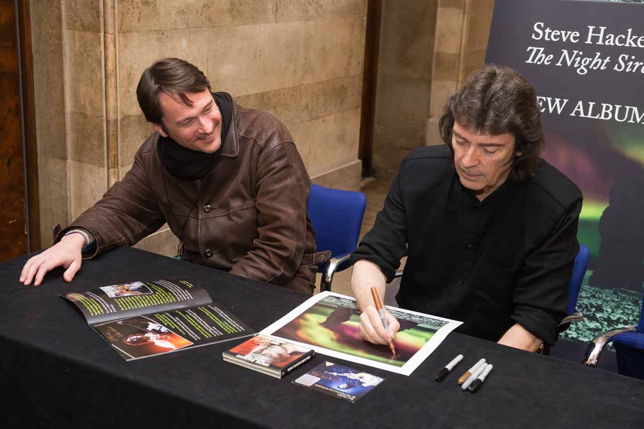 Hackett signing his new album The Night Siren.