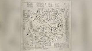 A large white map of 12th century China that shows the Great Wall fortification in sections along the country's northern borders.