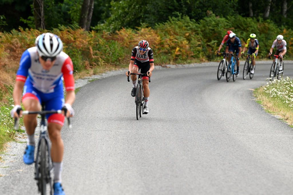 LA SOUTERRAINE FRANCE AUGUST 16 Valentin Madouas of France and Team Groupama FDJ L attacks ahead Alessandro Covi of Italy and UAE Team Emirates C of during the 55th Tour du Limousin Nouvelle Aquitaine 2022 Stage 1 a 1764km stage from VerneuilsurVienne to La Souterraine 385m TDL2022 on August 16 2022 in La Souterraine France Photo by Dario BelingheriGetty Images