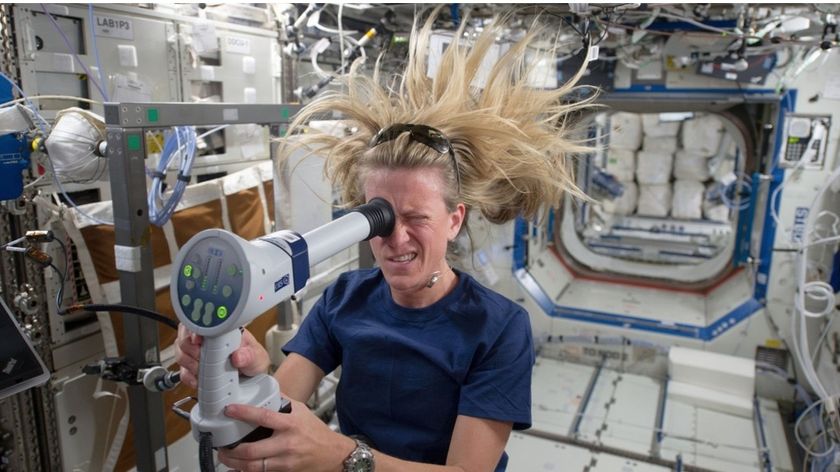 NASA astronaut Karen Nyberg images her eye with a fundoscope (an instrument used to examine the inner eye) aboard the International Space Station during the Expedition 37 mission in 2013.