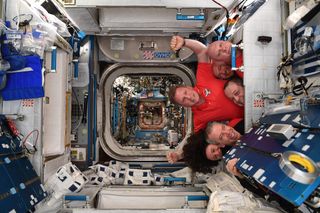 ISS Crew squeeze shot