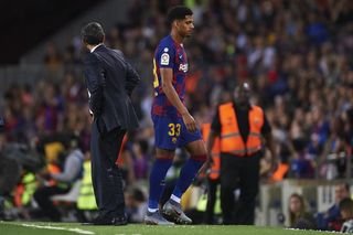 Ronald Araujo walks off the pitch after being sent off on his Barcelona debut against Sevilla in October 2019.