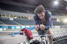 Alex Dowsett warming up on his bike in preparation for his hour record attempt in 2014