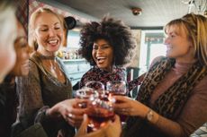 Group of women drinking wine wrong