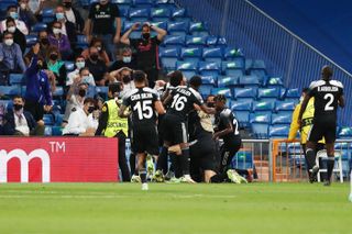 FC Sheriff celebrate their late winning goal against Real Madrid at the Bernabeu in the 2021/22 Champions League group stage