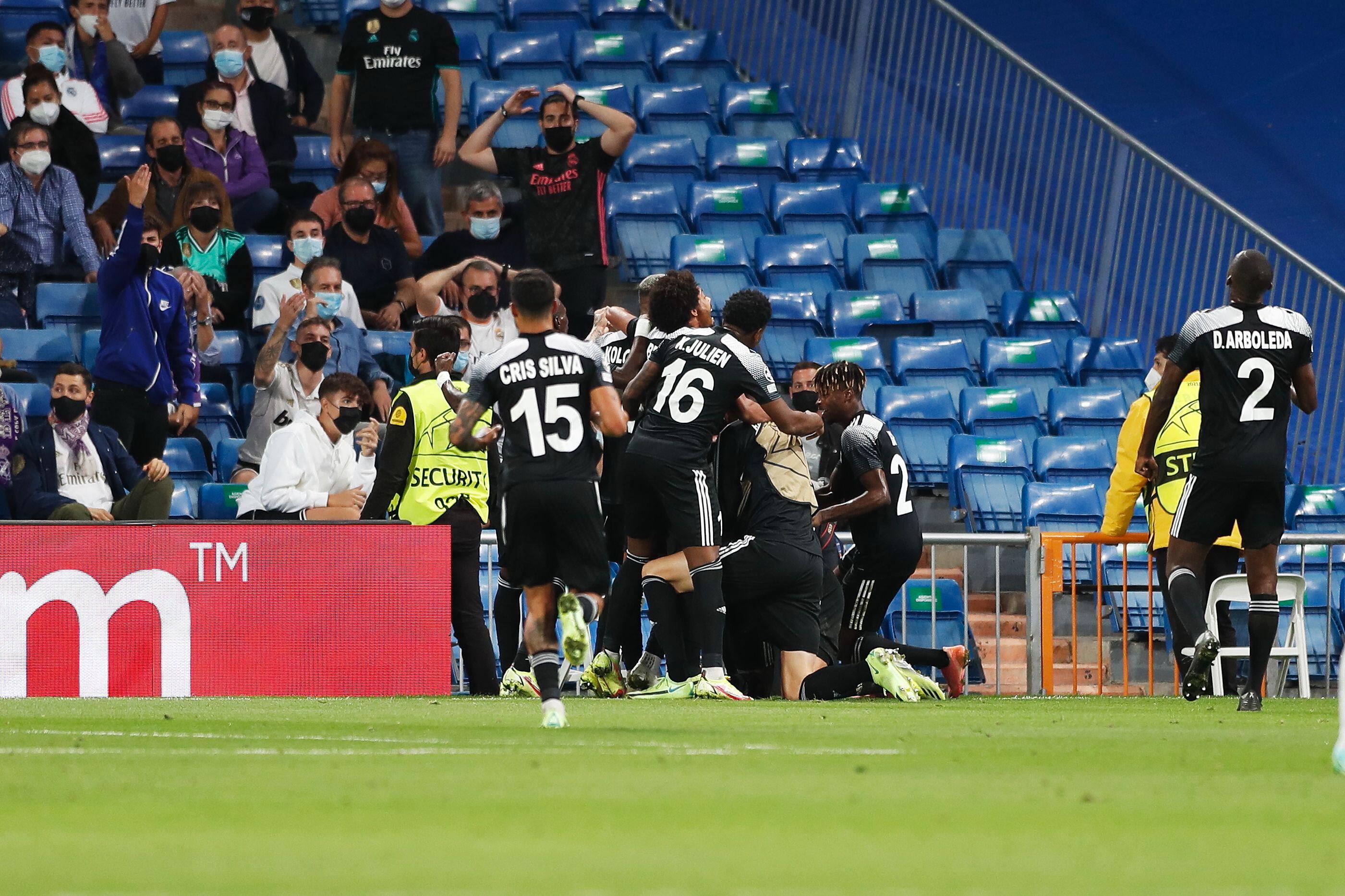 FC Sheriff celebrate their late winning goal against Real Madrid at the Bernabeu in the 2021/22 Champions League group stage