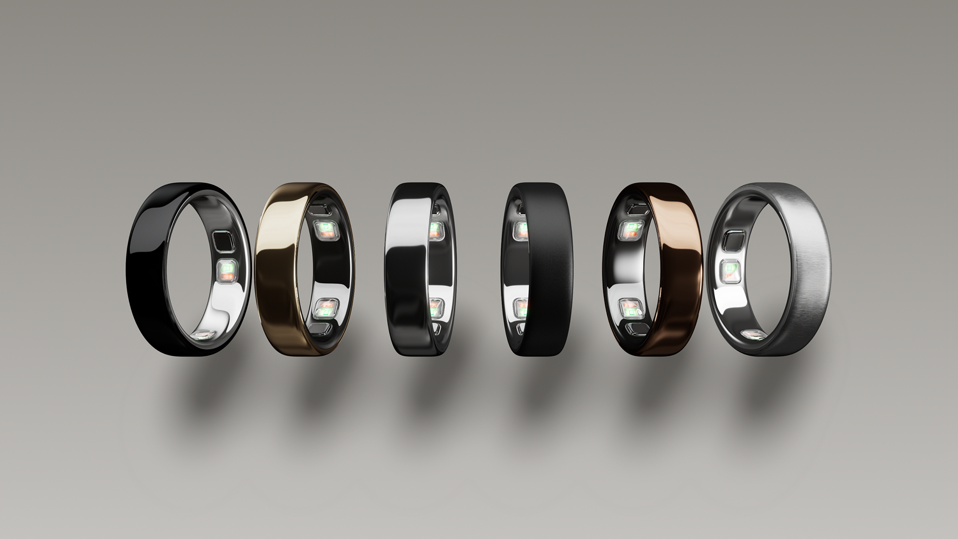 Six Oura Ring 5's lined up side-by-side showing the difference finishes