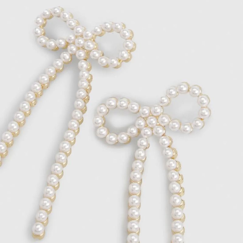 Karen Millen Pearl Bow Earrings cut out