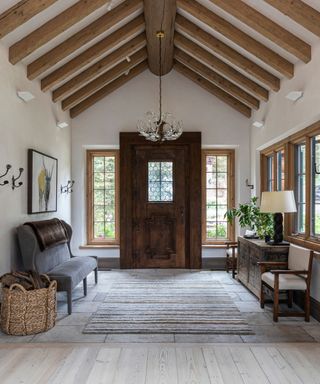 relaxing entryway with vaulted ceiling and cozy furnishings