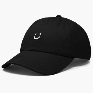 black baseball cap with embroidered smile detail 