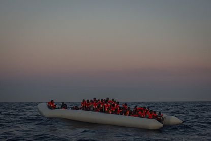 Migrants in a boat off of Libya.