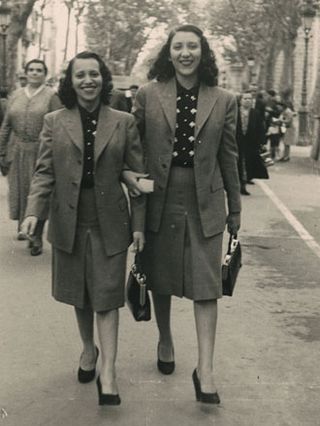 Photographs of the twins always appear arm-in-arm in the same position
